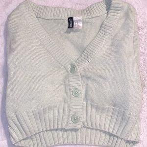 cropped green cardigan